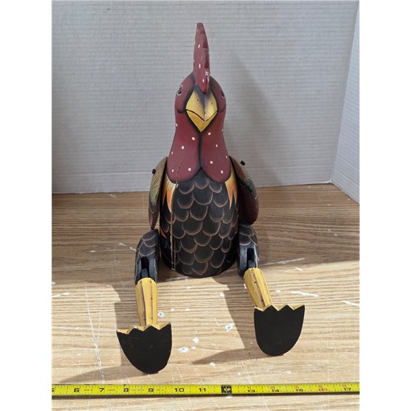 Wooden sit on a shelf rooster- has damage