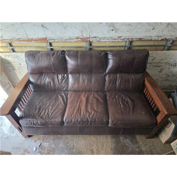Brown leather sofa with wood handles- 80" by 39" by 41"H