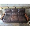 Image 1 : Brown leather sofa with wood handles- 80" by 39" by 41"H