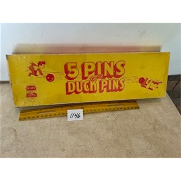 set of vintage bowling pins in box