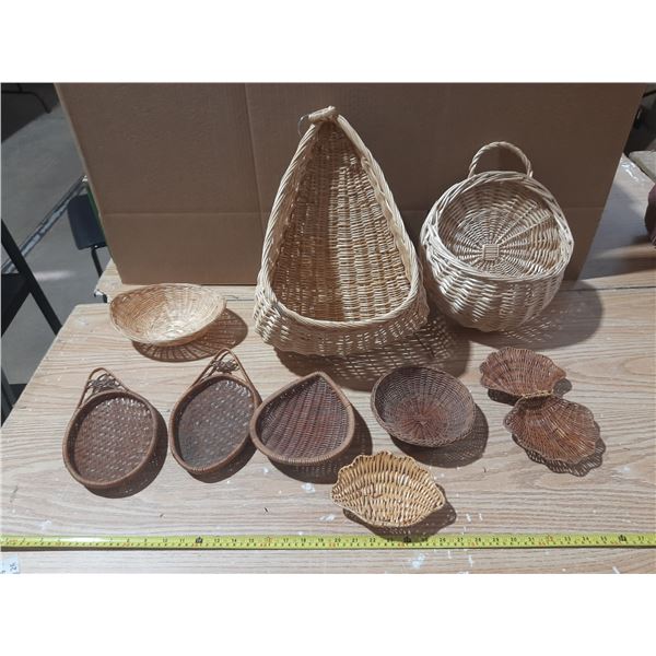 Lot of baskets of different size and colours.