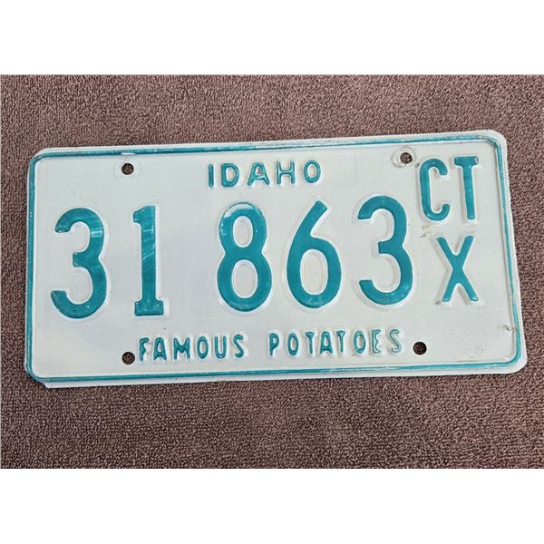 1326 - 1970s Idaho license plate.  "Famous Potatoes"