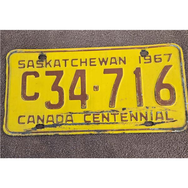 1328 - Saskatchewan 1967 "Canada Centennial" license plate.
