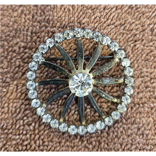 1332 - Vintage silver pronged rhinestone ornate brooch. 1 1/2".  No missing stones