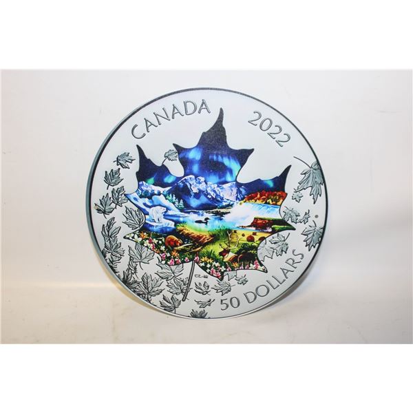 TIN METAL SIGN CANADA IN THE SHAPE OF A COIN