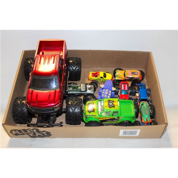 FLAT OF HOT WHEEELS MONSTER TRUCKS + OTHER TRUCKS