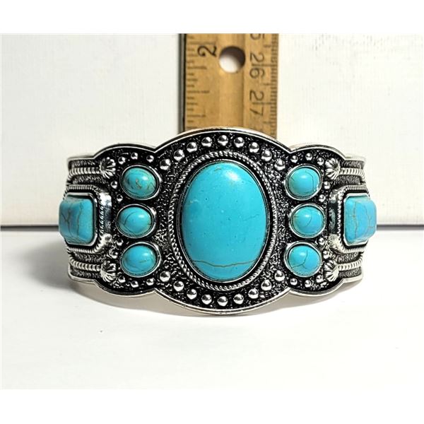 12)  SILVER TONE WITH FAUX TURQUOISE 1.5"