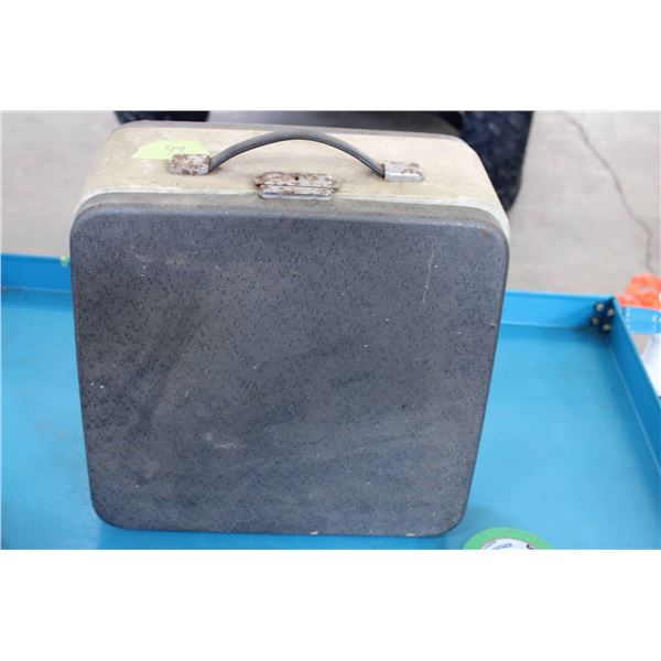 Olympia manual typewriter with case. Features a solid gray typewriter with a white cover, complete w
