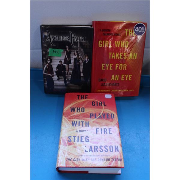 Three hardcover fiction books comprising 'Another Faust' by Daniel and Dina Nayeri, 'The Girl Who Ta