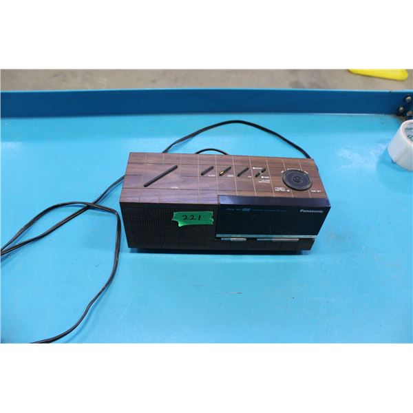 Panasonic AM/FM clock radio featuring a woodgrain finish