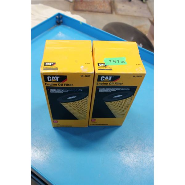 Two Caterpillar 1R-0659 engine oil filters, packaged in original boxes. 
