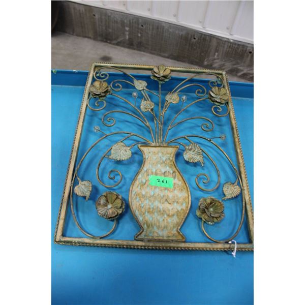 Ornate Metal Wall Hanging with Floral Vase Design
