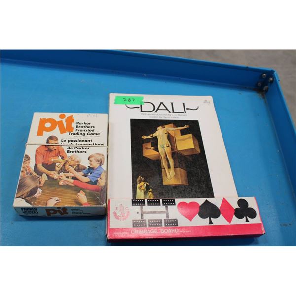 Parker Brothers Pit Trading Card Game and a copy of a Dali art book