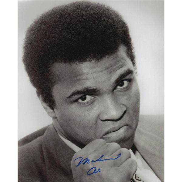 Muhammad Ali signed photo. GFA Authenticated