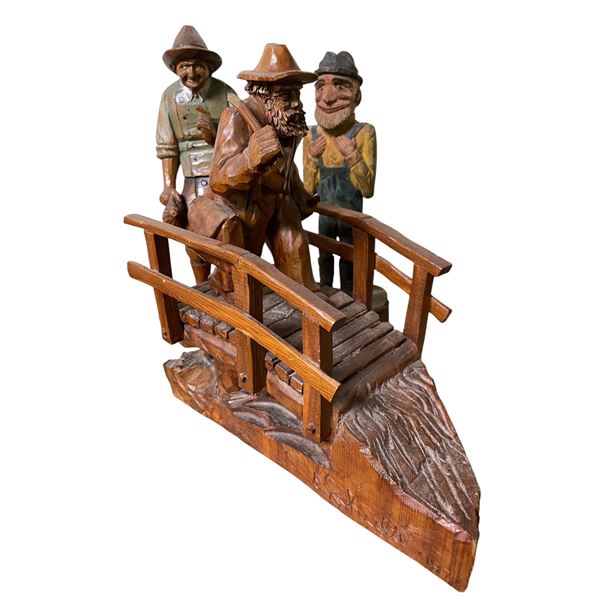 Hand-Carved Folk Art Wooden Figure Group on Bridge Base