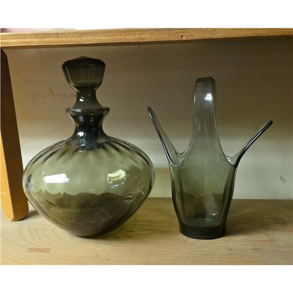 Two pieces of mid century smoky glass decanter and vases