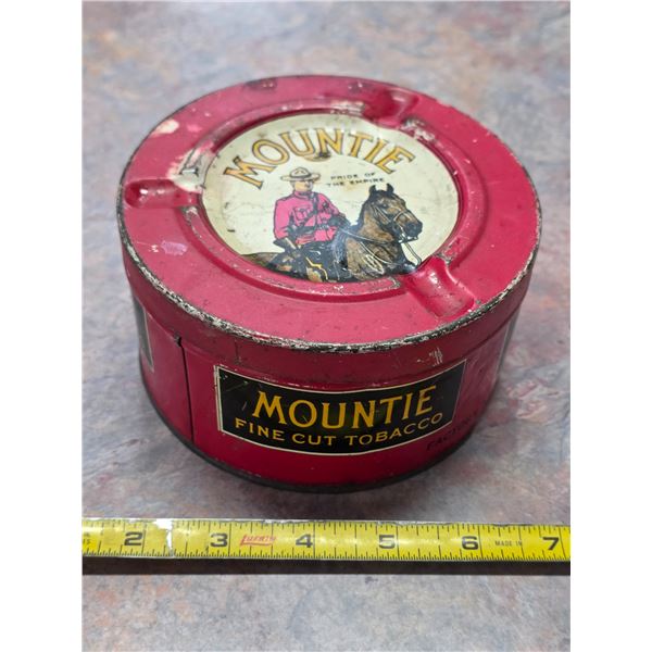 Rare round mountie tobacco tin