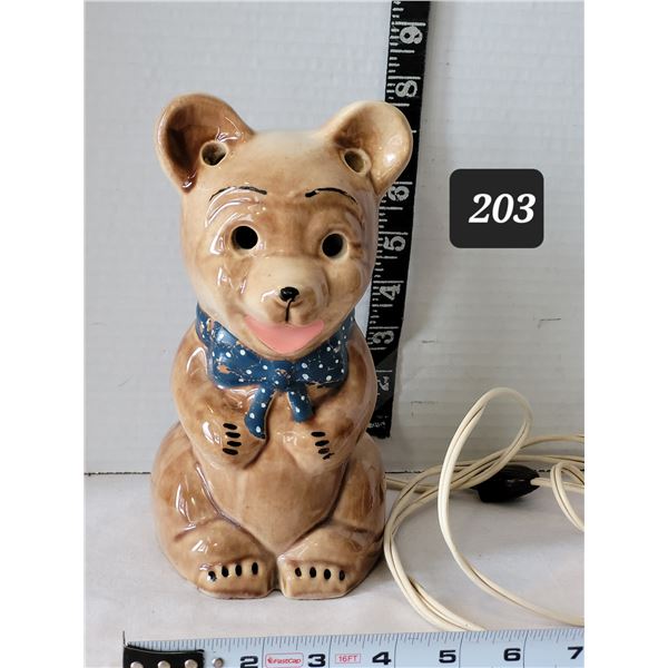 Vintage ceramic teddy bear night lamp. Push button switch on back.
