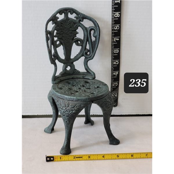 Cast iron doll size chair.