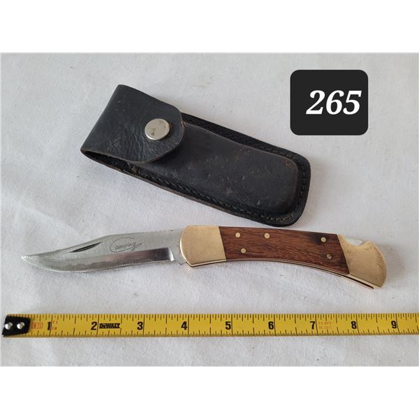 Wood & brass camping knife with leather belt sheaf.