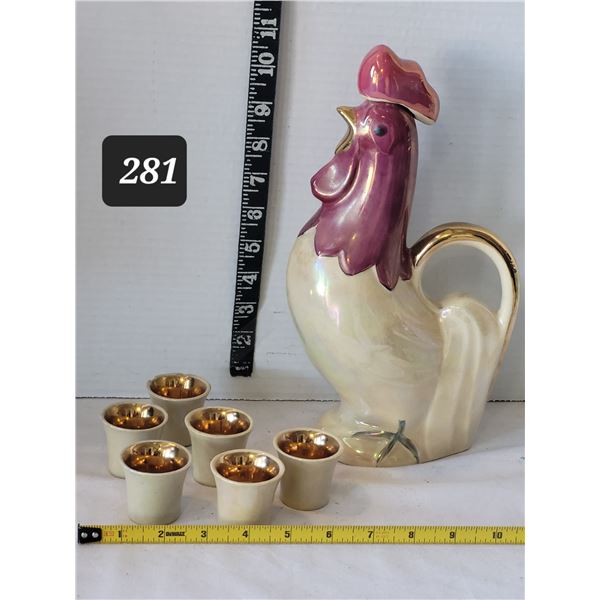 1950's ceramic rooster decanter & 6 matching small cups. Iridescent pearl purple glaze with gold acc