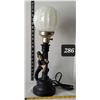 Image 1 : Mid century Hobo drunk, lamp post bar light. Iridescent globe.