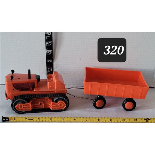 Mid century , battery operated Bull Dozer & wagon.