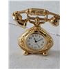 Image 4 : Brass miniature telephone victorian time pieces.