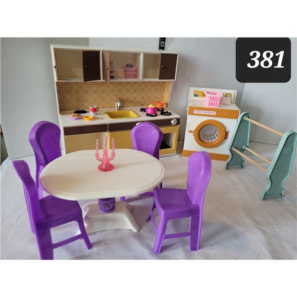 Barbie doll kitchen & accessories. Candles on fold down table light up.