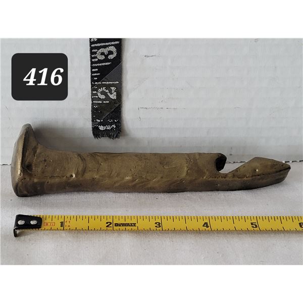 Railroad spike bottle opener.