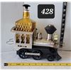 Image 1 : Mid century musical train liquor decanter. Plays when bottle is lifted. No glasses.