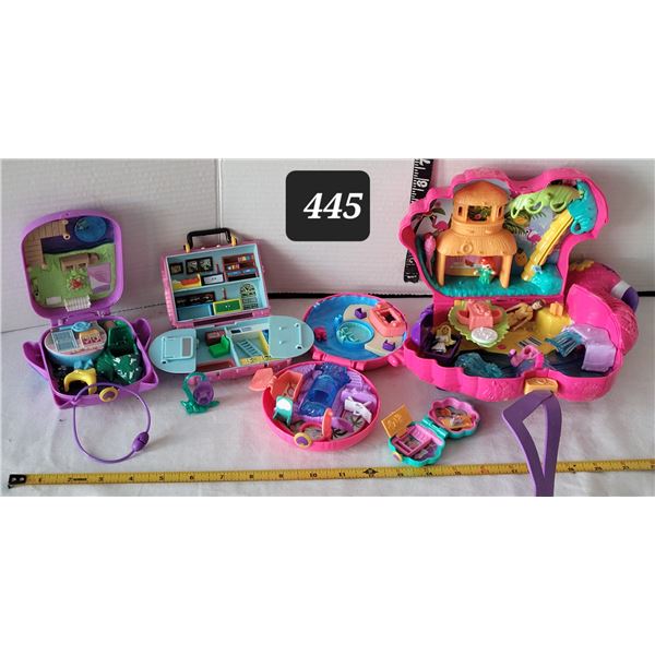 Polly Pocket play sets, with some accessories.