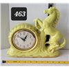 Image 1 : 1950's Snider 8 day horse clock. Green enameled ceramic housing. Wedge point , hand painted, Manual 