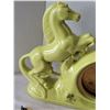 Image 6 : 1950's Snider 8 day horse clock. Green enameled ceramic housing. Wedge point , hand painted, Manual 