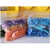 Image 4 : Lego storage brick containing bags of coloured lego bricks.