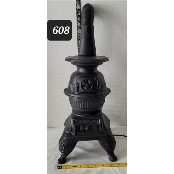 Ceramic pot belly stove plug in light.