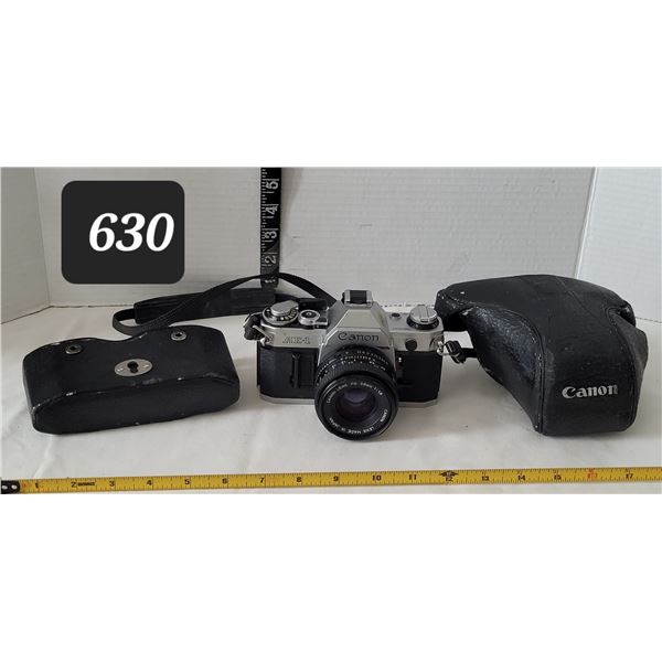 Canon  AE-1 35 mm camera.