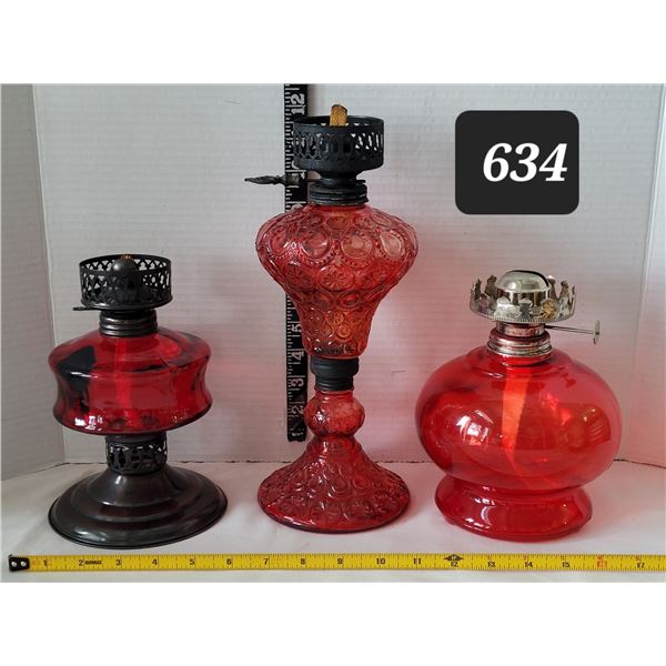 3 red oil lamps. No chimneys
