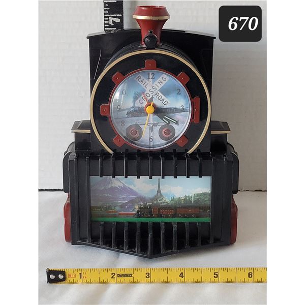 Vtg. All Aboard Quartz Train alarm clock with sound, lights & running sight screen.