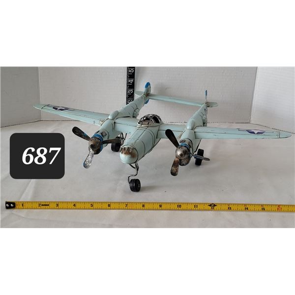 Vtg. P-38, Lightning style, light blue tin metal military airplane.