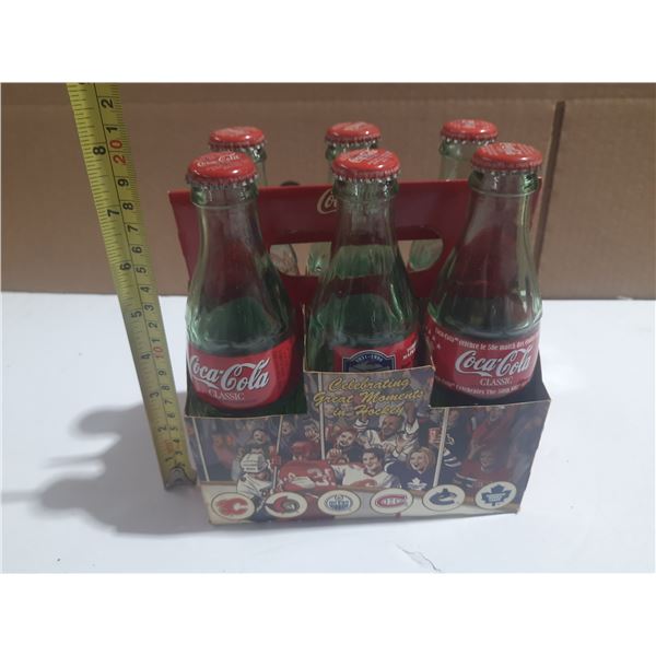 (6) Coca Cola Empty  Bottles.