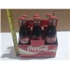 Image 1 : (6) Coca Cola Classic Saskatchewan Centennial 2005 Bottles. (Full)