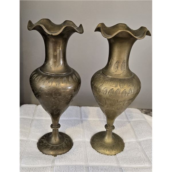 Vintage set of 2 brass engraved vases.  7" tall.  Marked India on bottom.