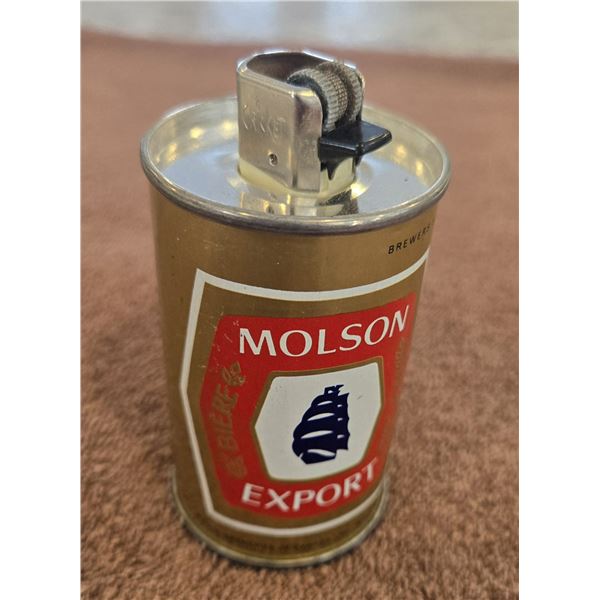 Vintage Molson Export beer can lighter from the 1970s. 3 1/2" tall.  Great condition.