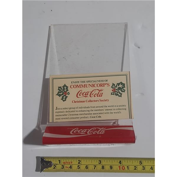 Vintage Promotional Display Stand for the Coca-Cola Christmas Collectors Society.