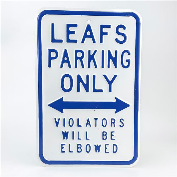 LEAFS PARKING ONLY VIOLATORS WILL BE ELBOWED SIGN