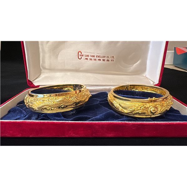 TWO APPROX 22K+ BANGLES WITH DRAGON MOTIF (73.7G)