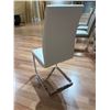 Image 4 : Set of 4 contemporary white faux leather dining chairs with chrome legs