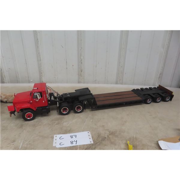 First Gear Die-Cast Model of International S-Series Truck with Tri-Axle Lowboy Trailer, 1/25 Scale