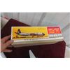 Image 10 : Marx Seaboard World Airlines Battery-Operated Tin Air Cargo Plane, 1960s, 14 1/2" Wingspan, in Box